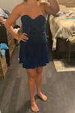 I like this dress a lot! The detailing is super flattering for the waist and the fabric is fun, soft and shiny. Great little party dress! - Kelsey W.