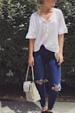 I wear this as a backpack during the day running errands and a top handle purse for the evenings! - Grace G.