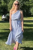 I bought this dress because I loved it in pics but wasn't sure how I would like it on. AMAZING! I LOVE the way this dress fits, looks, and feels. It fits perfectly and runs true to size. The fabric and fit is so comfortable. And the styling is so flattering! I wore it with a strand of pearls and hot pink heels (though you could wear flats too!) A simple white cardigan was the perfect touch for cool summer nights. Whether you have an occasion to wear this to or not, buy this dress for your wardrobe: YOU WILL FIND A TIME TO WEAR IT! Thanks Lulus! - Valerie L.