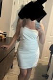 Very cute! It has a grippy strip at the top which is nice. Ends 1-2" above the knee, so not too short. I'm normally a medium but ordered a large; happy I did. - Megan C.