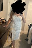 The lining in the back of the slit does show, almost like it needs to be sewn down. The zipper sticks a bit, but not too bad. Otherwise, cute and comfortable, I'll be wearing to my welcome dinner. - Megan C.