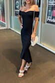 Wonderful dress. Lots of compliments. XXS probably would have fit me better. I found it wide in the hips. I had it tailored, and it was perfect. The fabric is thick enough and feels like good quality. Stays wrinkle free. - Chloe S.