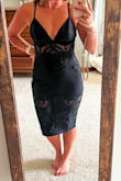 I love this dress. The adjustable straps are very nice. Dress fit true to size. It has some stretch but not where the lace is. It is a little longer on me than the model being that I am petite but I still love the way it looks. - Jennifer J.