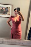 I honestly love how this dress looks on me but it's so tight. It's supposed to be looser and this is really tight in my chest area. Once I added some really good shape wear, it was a little bit more comfortable. I'm debating on keeping it and returning it. If I get a size up the sleeves and upper part will be too big. So I may return it. - Alexandra S.