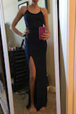 In love with this dress. The fabric is soft and comfortable, but it hugs your curves and the slit is cut just right. - Kaitlin H.