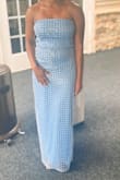 I love the dress! However, my seamstress had to take it in in the bust area and hemmed the bottom of the dress! It was a 100% show stopper! - Sarah O.