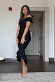 I bought this dress for a wedding. It fit absolutely perfectly and had a beautiful silhouette. I received many compliments on it. It was sexy without showing much of any skin. - Lindsey L.