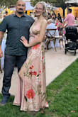 I have large breasts and the dress was very long in length. I could have dealt with the length issue but it was too showy for a wedding event, but I did look good. - April A.