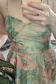 The skirt is very nice, but the upper bodice is bulgy and looks terrible. If you look at the left side of the model's picture, you actually also see this bulging. - Valerie B.