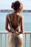 I wore this dress to my best friend's wedding. It fit all my curves and I got a lot of complements! Overall, beautiful dress. - Brianna R.