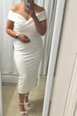 I've been searching for a fitted midi dress with a bow, for my bridal shower, and this one is just what I was looking for. I usually wear 12/14, so I ordered size XL, and it fits like a glove. I was worried about the tummy area, but it's quite forgiving. This is the second dress I have bought from Lulus for my wedding events and cannot recommend the price and quality enough! - Andrea D.