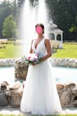 I loved this dress! It does cut pretty low so I had to even out my tan lines prior to wearing it for my summer wedding pictures. I'm 5'5 130lbs and the small was a bit snug in the waist but the medium was perfect. I am very small-chested and with the gel stick-on bra things, that area looked great! It is kind of fluffy at the bottom, but it's not heavy at all and very flattering. The length was perfect, and I only wore sandals with a small heel. I was so happy that this dress was the first and only dress I ordered and I fell in love with. - Holly R.