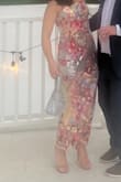 I just love this dress! I have never received so many compliments in a dress before (lie, I had but with another Lulus dress so...). The dress is as shown in the picture, which is a little transparent. I decided to wear a slip skirt underneath and a strapless bra and I think it worked perfectly. - Nicky P.