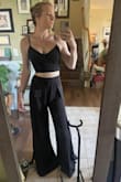 I love this but there's some issues with the fit. The top fits well, but the pants are just a little too loose in the waist (I think the next size down would have been too small though) and they're very long (would HAVE to wear pretty high heels so I don't trip over them). I like the idea someone else had of tying a knot at the ankle so I may try that when I wear this out. - Hannah A.