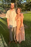 I saw this dress and was immediately in love! It was perfect for my friend's outdoor summer wedding. When I first tried it on it fit quite snugly in the bust area and I debated exchanging for the next size up, but once I loosened the adjustable ties in the back it felt a lot better. I'm also on the shorter side so it was longer on me than on the model in the picture but I didn't mind that. I loved wearing it and got a lot of compliments on it! - Becca G.