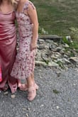 I got a lot of compliments on this dress as a wedding guest! It was so tight on my torso though and I am a 34B. - Larissa K.