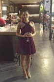 I bought the dress in burgundy and it was really perfect so I bought it in black too. The dress is really flattering, not too short and perfectly suited to my size, glad I bought both colors and maybe more in the future. - Gal P.