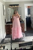 The material is nice it will need to be steamed but other than that it looks really nice and it's light and airy but also a little more form fitting. It's very comfortable and just overall very cute! Would recommend buying! - Lily B.