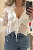 Fun and flirty top! Super cute with jeans but can be dressed up with leather pants! - Jessica F.