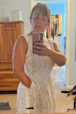 I'm short (5') so it is more tea length but with the very bottom being unlined lace, it doesn't feel heavy or cut me off. Plus, I can wear a normal bra with it? And pockets?! I can't wait to wear this out! - Tara R.