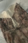 Runs small. I received it without the corset ribbon at the back. Disappointing. I will return it. - Irene H.