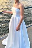 This dress fit like a glove! Perfect! Used it for the videoclip for the wedding and the dress shimmered throughout the clip! - Manjola H.
