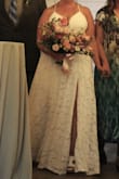 I chose this dress after trying many! The fit was perfect for my curvy body! The bust was adjustable, and the hips were loose and comfy! The slit offered ease of walking and a little sex appeal! At 5'5 and 4 inch wedges, it just skimmed the floor with a nice trail! - Krista M.