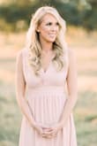 This dress was perfect for my engagement pictures! I loved the length-I was able to wear my heels with it without it becoming too short. With 4 inch heels, the hem just brushed the ground. The slit was not "too much" for pictures. As I am a bustier girl, I cannot pull off low-cut outfits without looking a little...too sexy. I put a tack (small stitch) on the front of the dress to pull it closed so that I could wear a sticky bra underneath it. This worked perfectly! I typically vary between small and medium, but for this dress the small fit perfectly. The pictures were taken by Luke and Cat Photography. - Jana K.