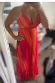 The color is amazing! And overall the fit is good - altho getting the last few inches of the zipper up on my own was a feat!! It's also a little long for me, need to wear higher heels with it. - Courtenay R.