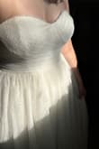 Dress runs true to size. Close up photo to show the lace detail. Perfect amount of poof. I will be wearing heels and it floats on top of the floor with the heels. Would be a hair too long in flat shoes. - Cierra S.
