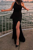 I wore this to my friends wedding and got tons of comments! I was in between sizes M and Large but I went with the L instead. If I wore M, it would've been too tight for my wider hips and thigh, slit would've been too high but was perfect for my chest. I stuck with Large- the top was slightly loose but barely noticeable and the bottom half was perfect. I did wear this without a bra and had petal covers to smooth out the chest area but if I had added silicone adhesives, Large would've been just right with no upper body looseness. Overall I still love this dress, and loved the open back! - Jessica C.