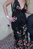 This dress was amazing. The material was soft and airy. The fit was perfect I have never wore a low cute dress this was a first and it will not be the last. I felt sophisticated sexy and classy all in one. The pattern was perfect. Everyone should have this dress - Maureen C.