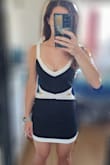 Its a super cute dress and style idea, but I'm 5'7" and it's pretty dangerously short on me, especially in the back! I feel like so many of lulus mini styles just need to be 2 inches longer for anyone about 5'4"!

For shorter ladies, I say go for it, though! I'm usually between an XS and a S in lulus, and for this one I'd say you could probably do either, it just depends on how you want the skirt to fit - Ariana R.
