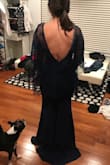 I bought this dress when it was final sale, and I was very concerned about the fit/style. I am very short and sometimes dresses doesn't fit so well... but THIS DRESS is great! Its flattering and the back is so sexy! I recommend, cant wait to wear it! - Deise S.