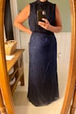 Gorgeous color and fabric! Love the flower detail. Run snug through the hip. No stretch in the lace overlay. Moved up a size just for hips. - Tammy D.