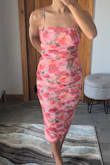 I love the design on the fabric and how lightweight it is. Unfortunately, it is snug around the hip area and bottom hem, cutting my stride short.  I am a size 6 and ordered my usual S, however, I think a M would have worked for me. Edit: After receiving a size M, I should have stuck with the S.  The M dress I received has some issues with the zipper and is much too loose around my 34C chest. - Nadine G.