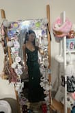 The dress fits perfectly and the laced up back allows be to cinch it to my body. It is a little long for me as I am quite short but nothing a little altering can't fit. The dress looks beautiful on and the colour is gorgeous. It sparkles really stunningly as well. - Angelei C.
