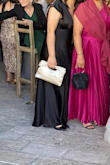 I bought this for a wedding. Such a cute clutch, perfect size I was able to fit a lot in there. The material was better than expected as well. - Ashley O.