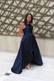 This dress. Where do I begin!? I felt absolutely stunning!! I got SO many compliments!! Has DEEP pockets and it sucked me in all the right places. When I walked, the train flowed behind me. It was magical!! The material was thick and perfect. Highly, highly recommend!! - Christine M.