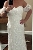I ordered this dress in 2 sizes and kept the smaller one.  I feel like it runs on the small side, as I'm usually a 8/10 or size medium and the large fits me perfect.  BUT, I LOVE this dress!!! It's exactly what I was wanting for my wedding - Sherie A.