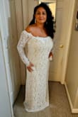 This was my initial review, Im having to edit it because every bride's worst nightmare happened, the dress broke the morning i went to put it on AGAIN. Completely devastated. I had to find something in my closet literally! Luckily this was for our Justice of the Peace wedding as we have a destination wedding next year but still. 

I'd give 5 stars but I'm 5'4 so the dress was just too long. The only complaint I have is the sleeves are so tight fitting, maybe because I'm top heavy so it pulls more up top for me. I did have issues with the zipper mid way and it broke so I had to get a new one sent. Lulus has got to have THE ABSOLUTE BEST CUSTOMER SERVICE, HANDS DOWN!!! I had correspondence and a new dress in the mail within 24 hrs!  

It looks just like the picture. I'm getting it altered for the length which cost me as much as the dress but honestly for the price of this dress it was still a deal!!! Wedding isn't until Aug 9 so I don't have pics to post yet. If you're considering the dress, do it!!! - Lila O.