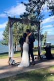 Wore this on my special day. What a beautiful dress!! Got compliments on it. Long and a little big for my bust but it was perfect otherwise. - Jules C.
