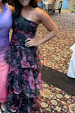 This dress is GORGEOUS. I wore it for a black tie wedding and I was obsessed with everything about it. The way it fit, the color, the material, the way it flowed when I walked. GET THIS DRESS. The organza did rip in a few places, but you can't really tell and it is well worth it. - Kristen K.