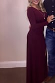 I wore this dress to a November wedding, and wow! It was perfect. The material has a thick, high-quality feel, and it falls so nicely. The thigh-high split gives the high neckline and long sleeves a little flair without being too revealing, never once felt inappropriate at a family function! afterwards, I washed it on a cold cycle and air dried it, you cant even tell it has ever been worn. - Kaitlin N.