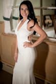 I couldn't have gotten a more perfect dress for my wedding! Everyone fell in love with it! It hugs your body making it look amazing! The back is just perfect! Comfortable and most important is not see through! I would recommend %1000 - Carmen S.
