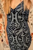 This dress is absolutely stunning and everything I hoped it would be. Fits like a glove and is so flattering. The color is gorgeous and I love the sparkle. - Andria R.