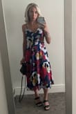 Loved this dress! Needed a hint of red and this was perfect. Loved the pleated skirt. (I did need to put a stitch at the chest to keep it from gaping open, but that's an easy fix!) - Val K.