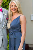 This jumpsuit is amazing. The material is so soft and good quality. The fit is perfect. Love the length...Im 5'4" but very long legs and was still the perfect length with wedges. I would buy one in every color of available. So many compliments on this!! The shoulder straps are adjustable which is great. - Leah V.