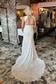 This was the absolute dress of my DREAMS!! I just wish it came in a larger size&. The (very necessary) alterations that I had done to the back, and the cups I had put in made the dress way too tight and I could barely sit down in it. I wish this one had worked out. - Leah H.