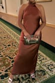 I got many compliments. Perfect for a formal event. The neck was a smidge tight, and wrinkles were really hard to get out. I suggest dry cleaning as soon as you receive it. Paired with light gold shoes. Was perfect! - Deanna C.